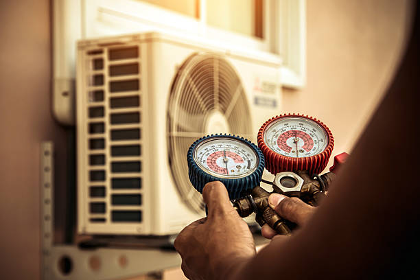 Professional Ductwork Repair technician working in Linwood, MA